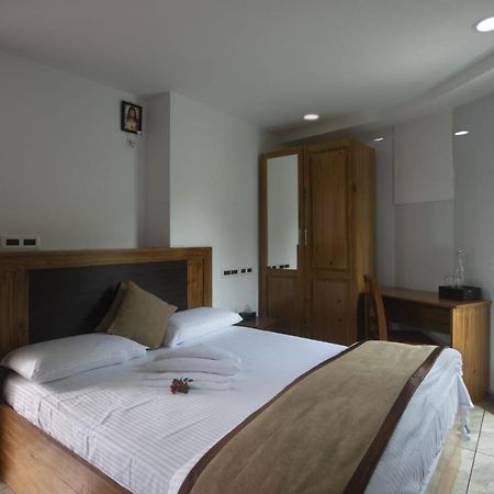 Magni Home Kochi Buitenkant foto