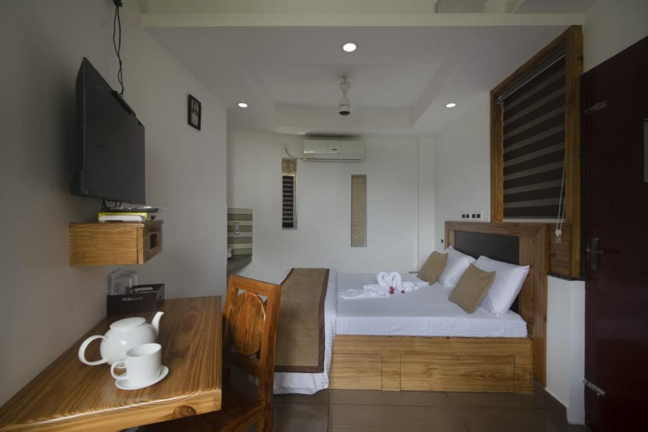 Magni Home Kochi Buitenkant foto
