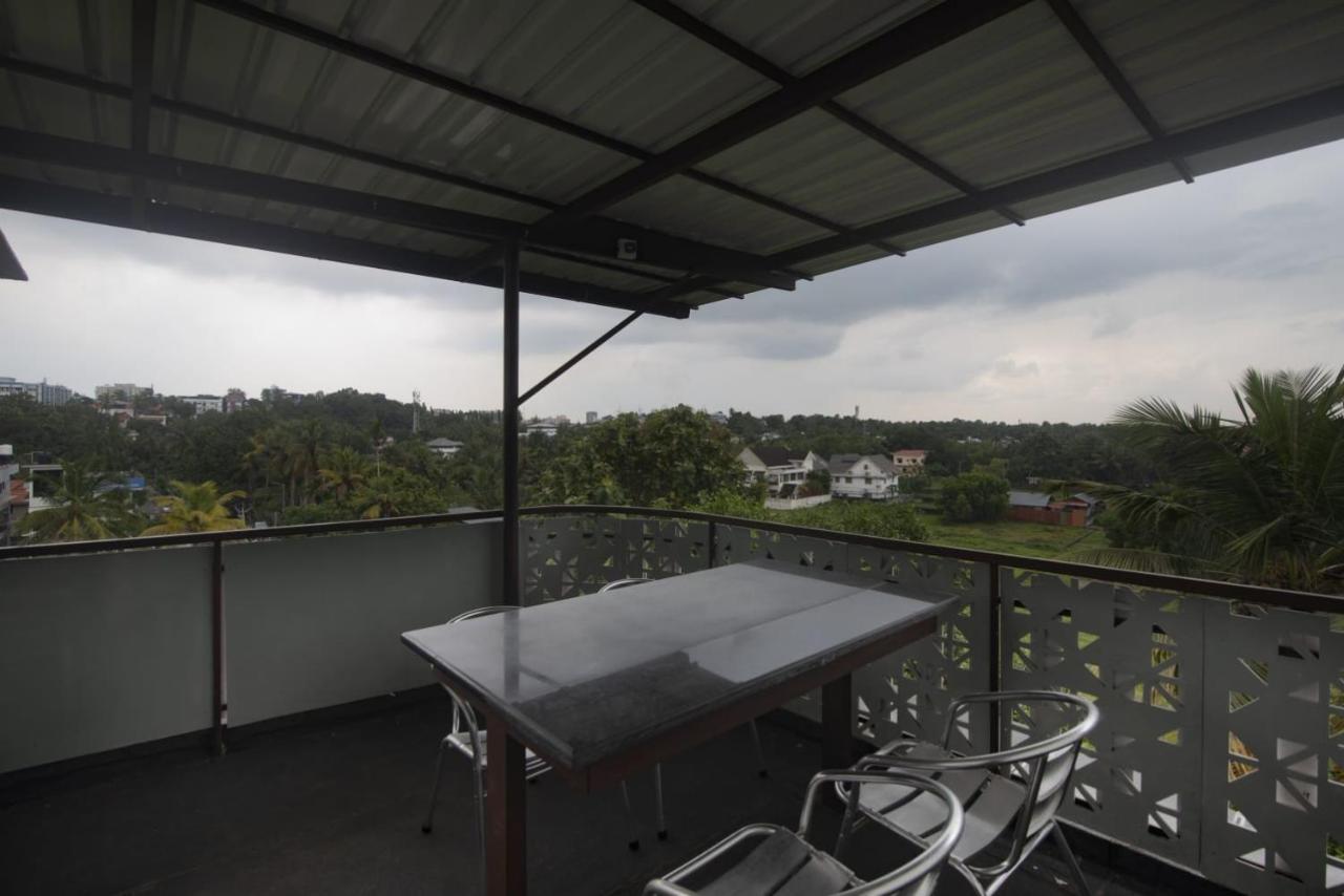 Magni Home Kochi Buitenkant foto