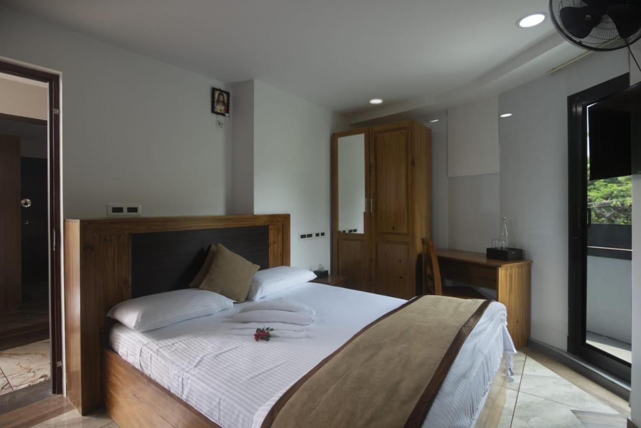 Magni Home Kochi Buitenkant foto