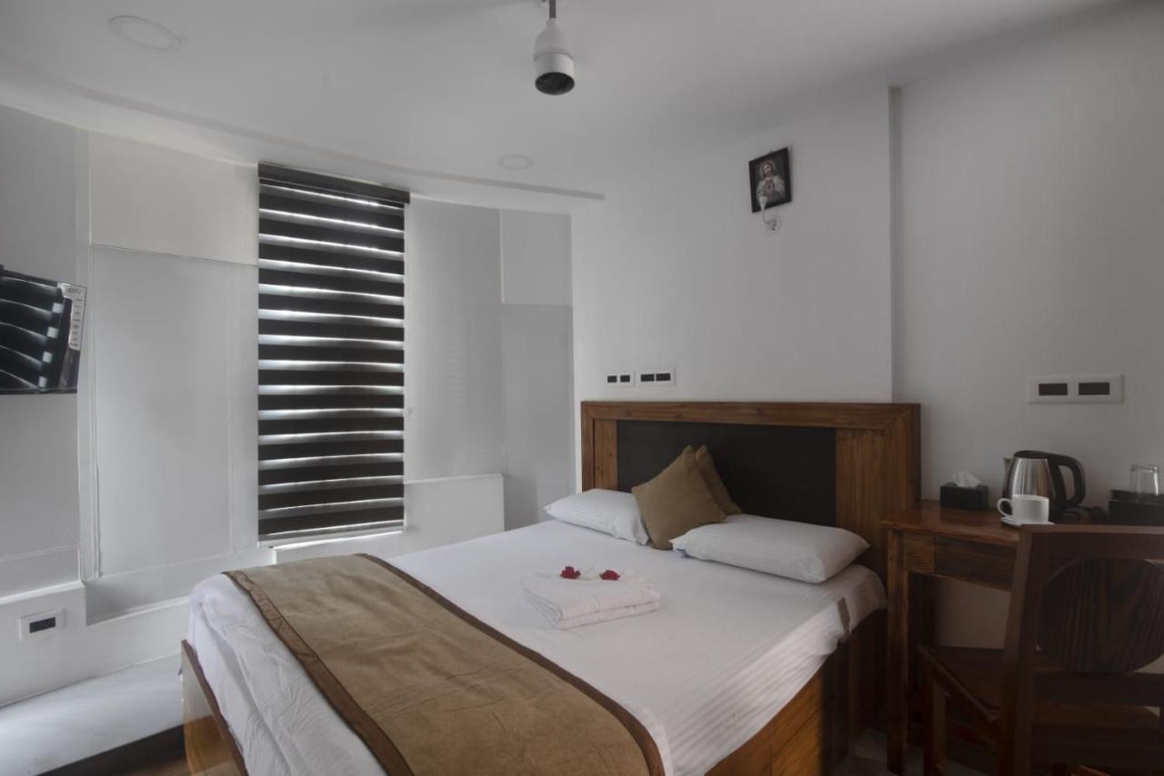 Magni Home Kochi Buitenkant foto